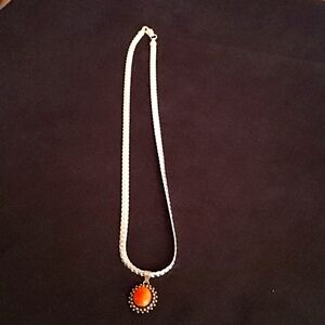 Ladies (ss925) Necklace w/ coral reddish orange (ss925) pendant.